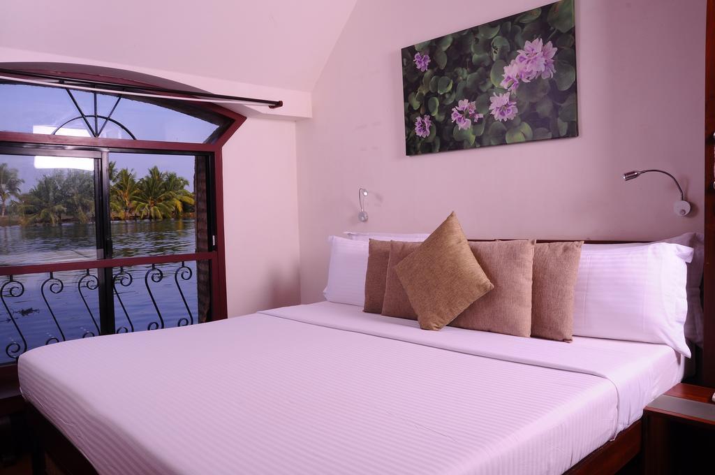 Hotel Xandari Riverscapes Alappuzha Habitación foto